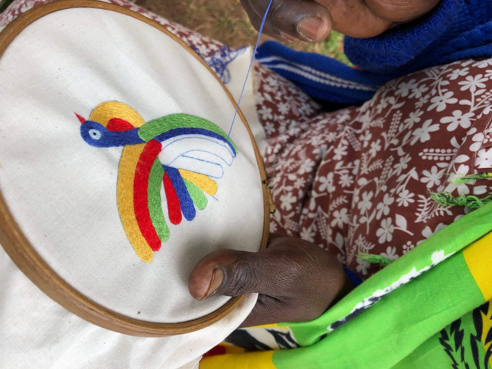 ibaba-fairtrade-gifts A close-up of a sample hand-embroidered gift of the Peace by Piece International logo