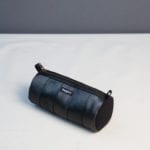 Black essentials tube pouch