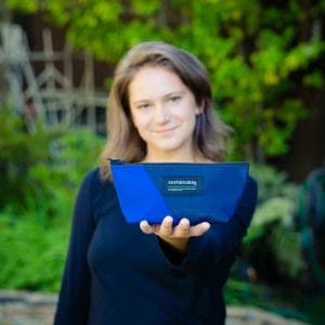 woman holding blue pencil case
