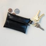 Coin and key purse on flat surface