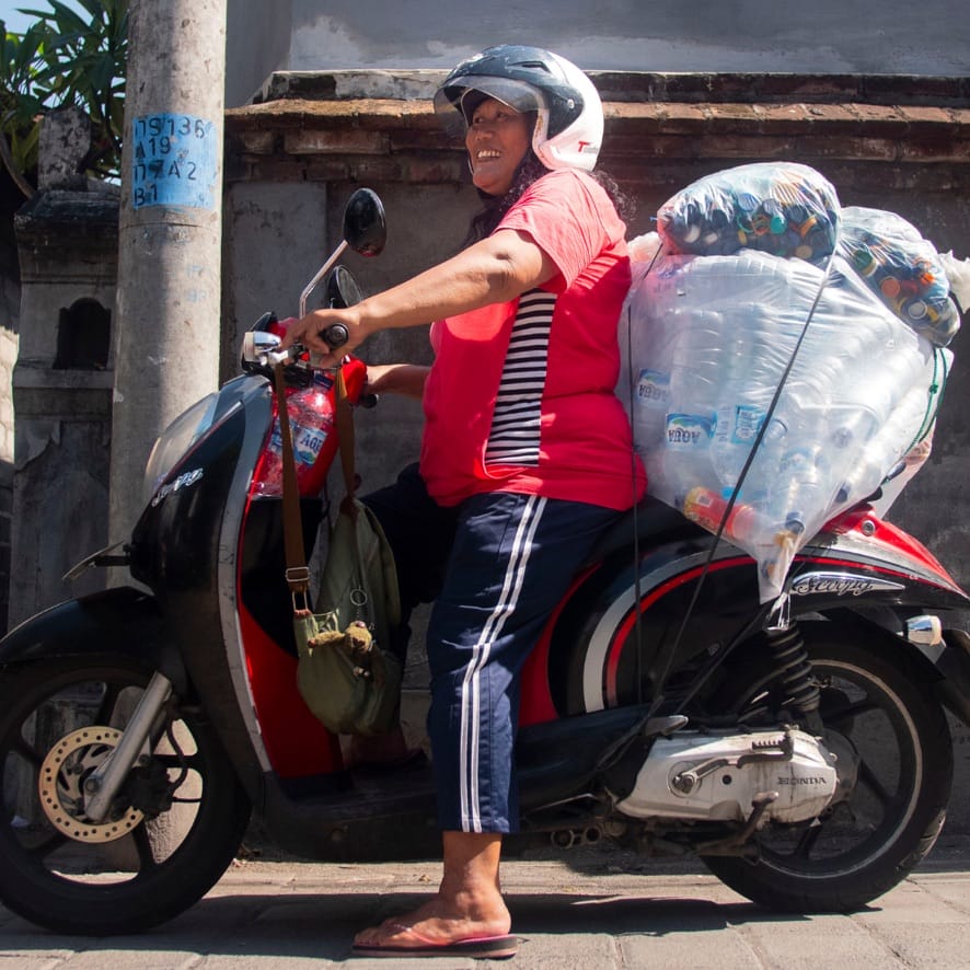 Kuntari is a plastic collector in Indonesia. Her collections help you customize insulated water bottle with your logo.