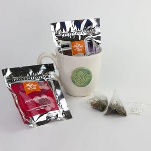 Our "It's Tea Time!" corporate tea gifts include a handmade ceramic mug and two tea packets.