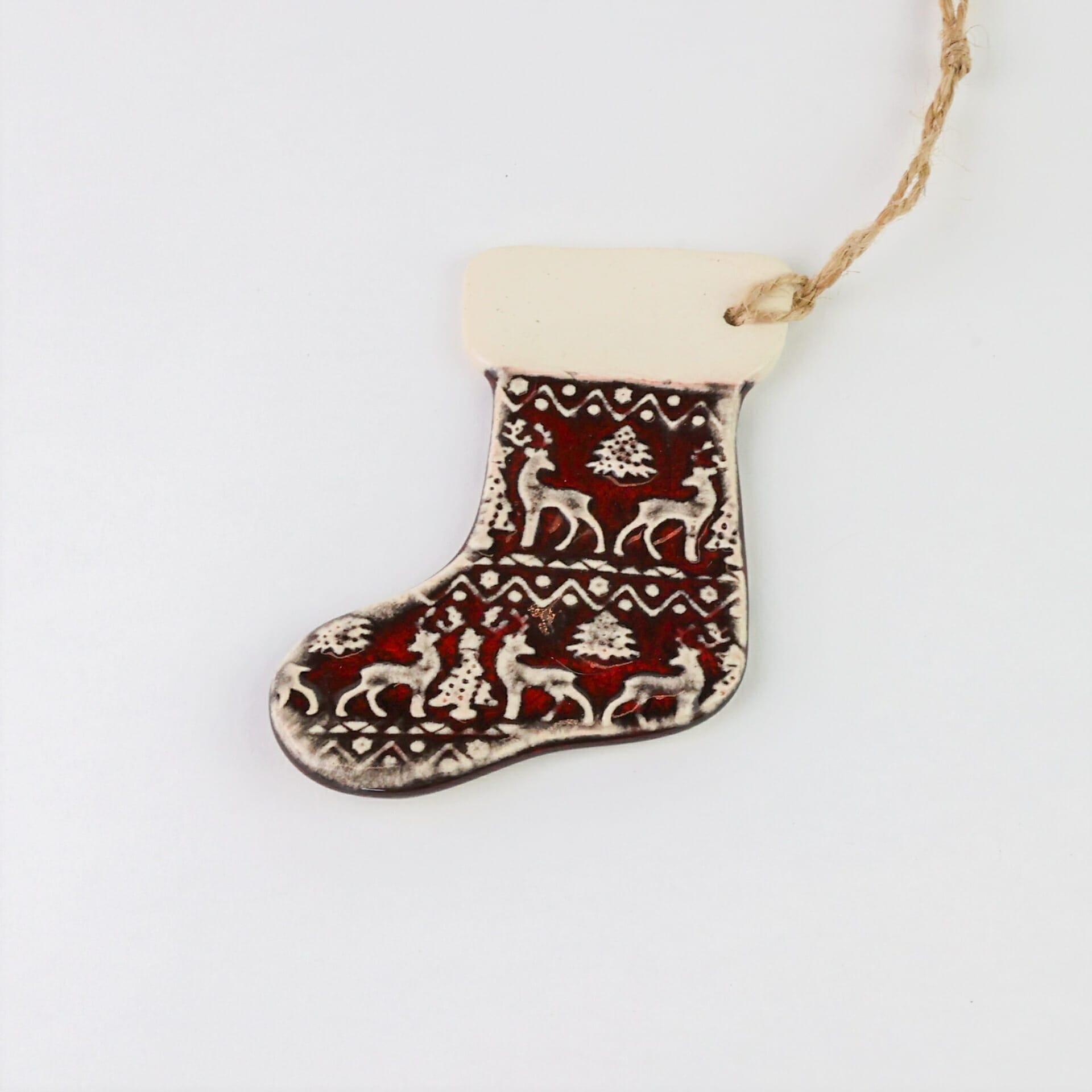 This stocking custom ornament is made by women transitioning from homelessness and poverty.